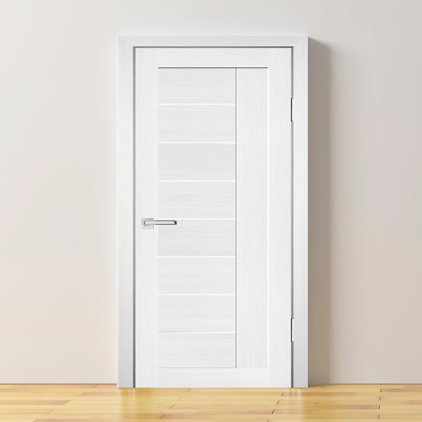 White door on a plain wall with wooden floor